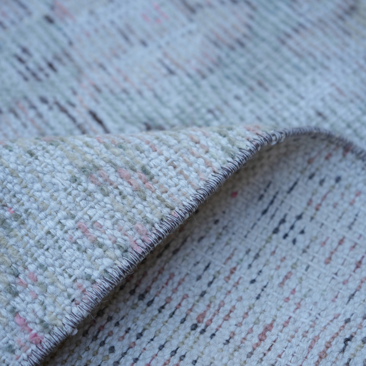 Additional view of the pink Turkish distressed vintage rug, hand-knotted in wool and cotton.