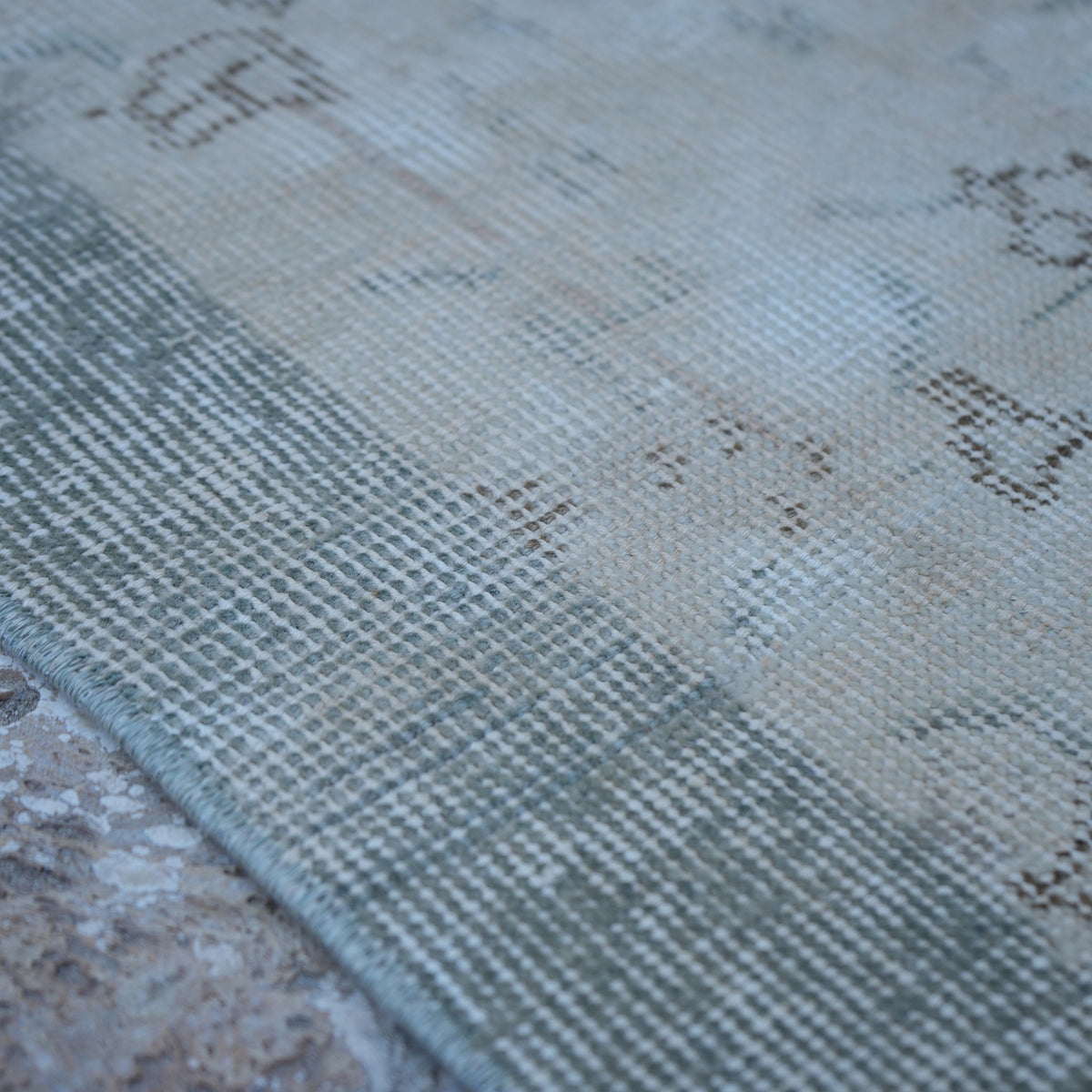 Beige 4' x 6' Turkish distressed vintage rug in wool and cotton, shown on the floor.
