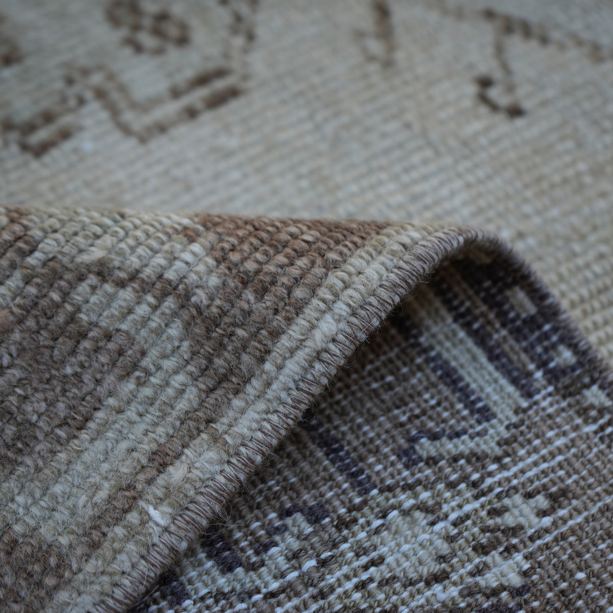 Brown 4' x 7' Turkish distressed vintage rug from the 1970s with traditional design.