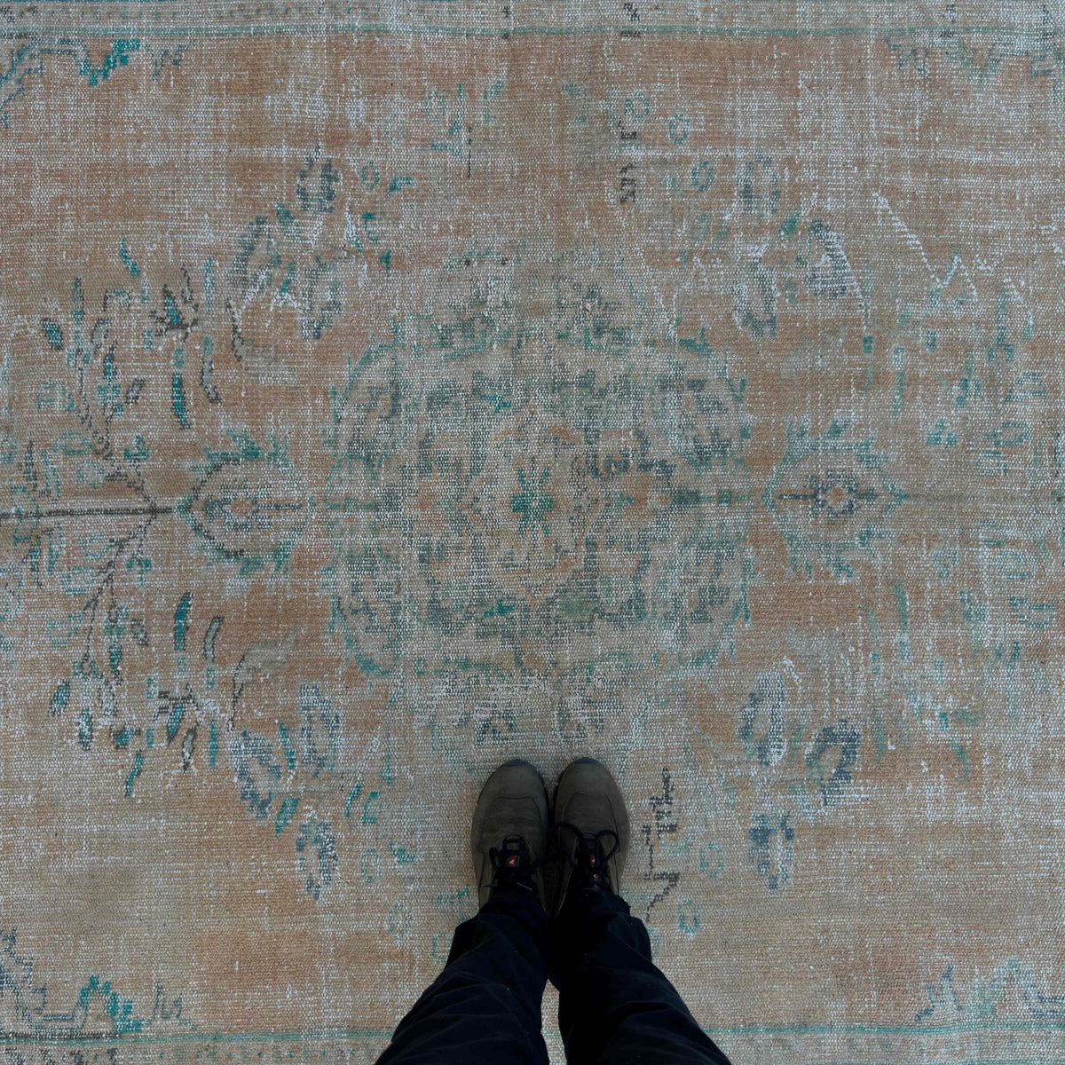 1970s orange Turkish handknotted rug with medallion design, hand-knotted weave and low pile.