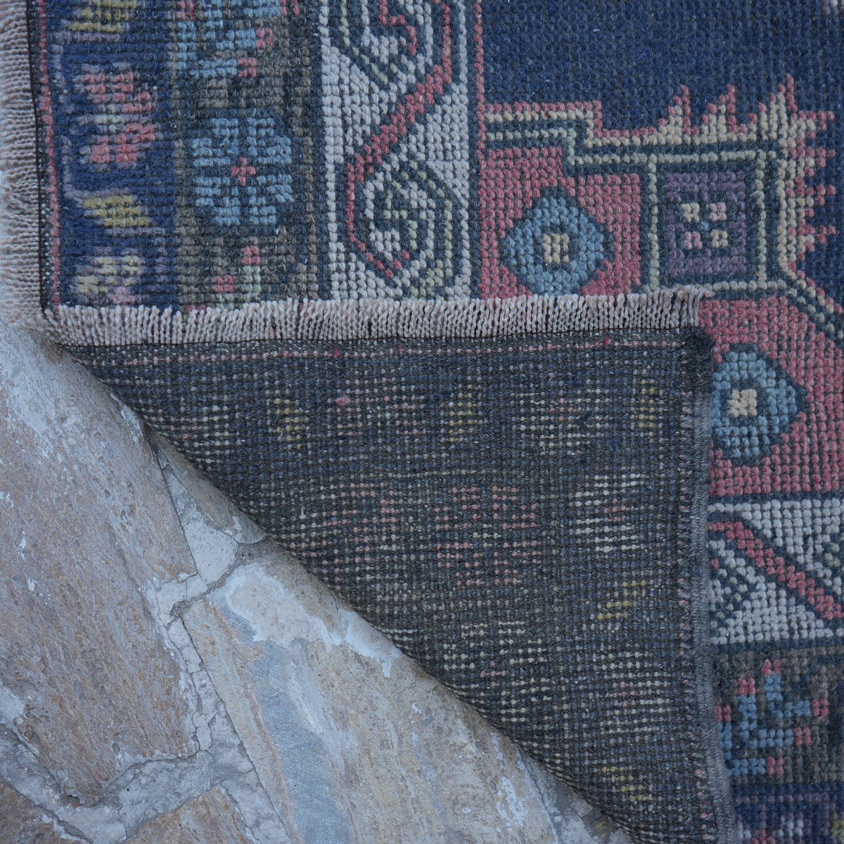 1970s pink handknotted turkish rug with traditional design, hand-knotted weave and low pile.