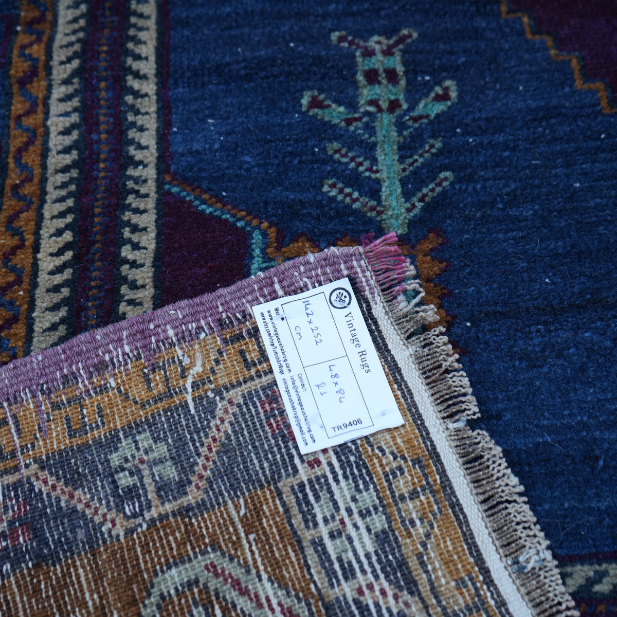 Blue 5' x 8' Turkish handknotted wool rug from the 1970s with traditional design.