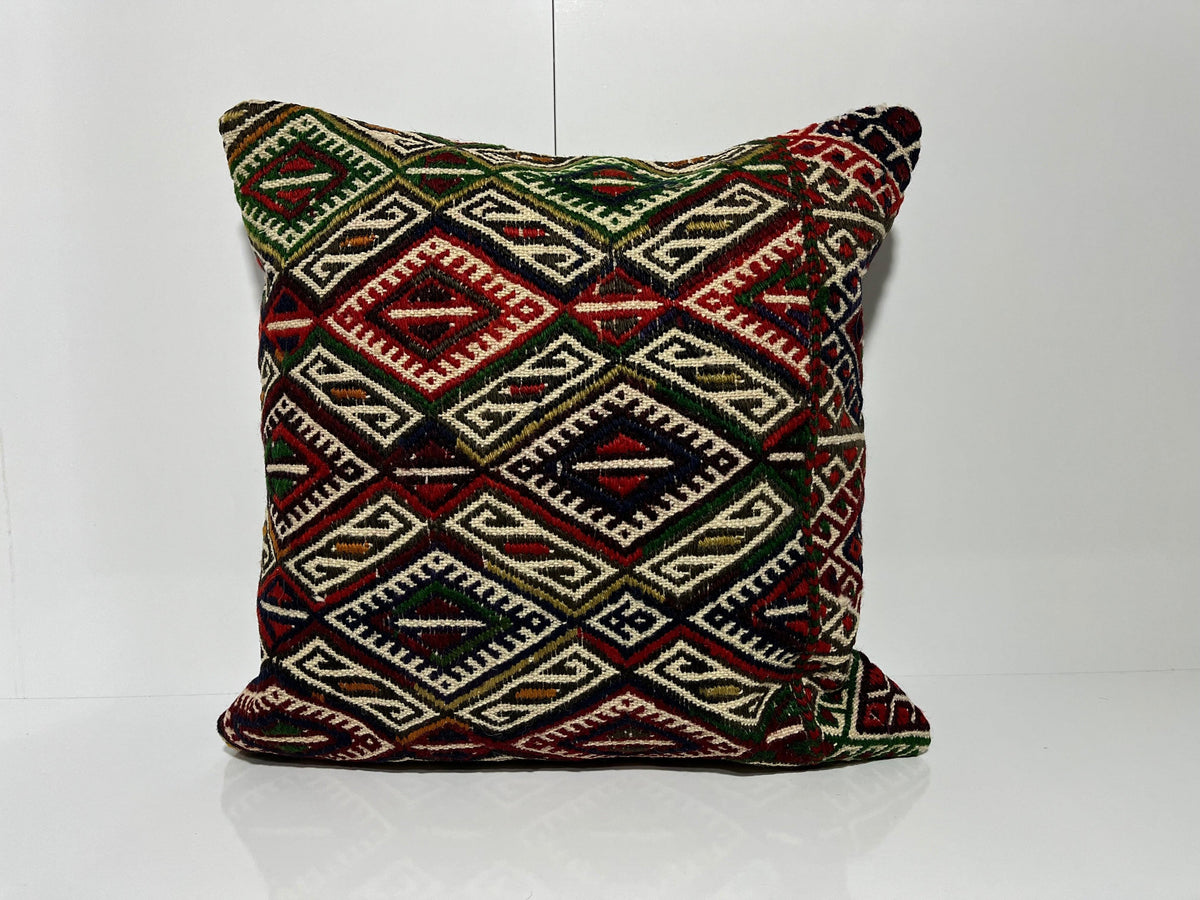 Green kilim pillow with geometric design, handmade in Turkey – EE00120.