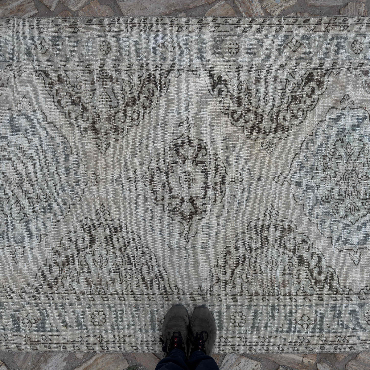 1970s pale blue Turkish large traditional rug with neutral design, hand-knotted weave and low pile.