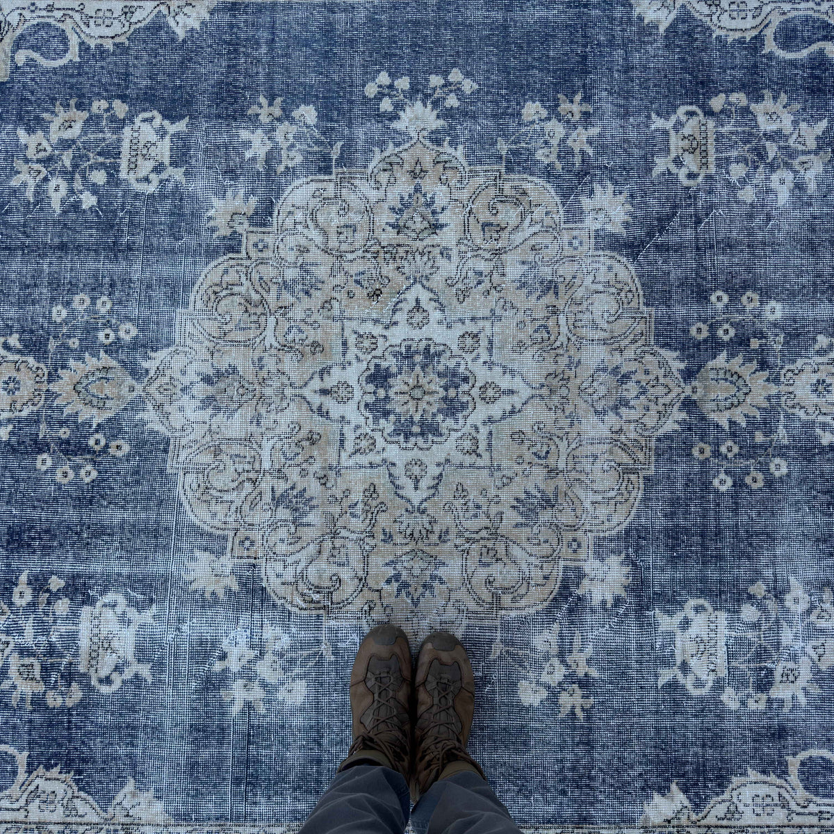 1970s blue Turkish large vintage rug with medallion and neutral design, hand-knotted weave and low pile.