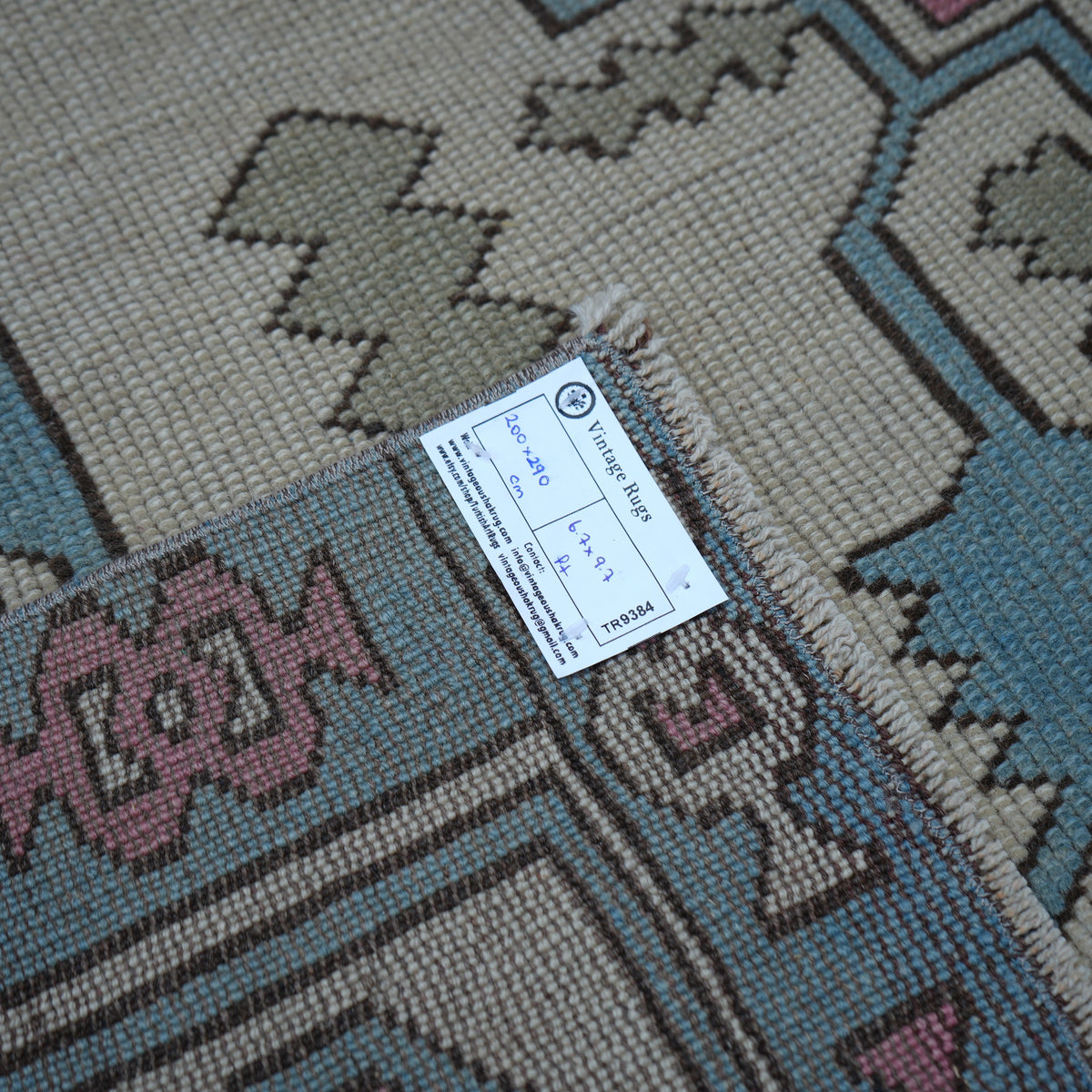 Pale Pink 7' x 10' Turkish large wool rug from the 1970s with geometric design.