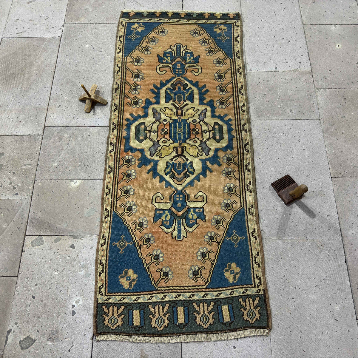 Blue 2' x 5' Turkish mini runner rug in wool and cotton, shown on the floor.