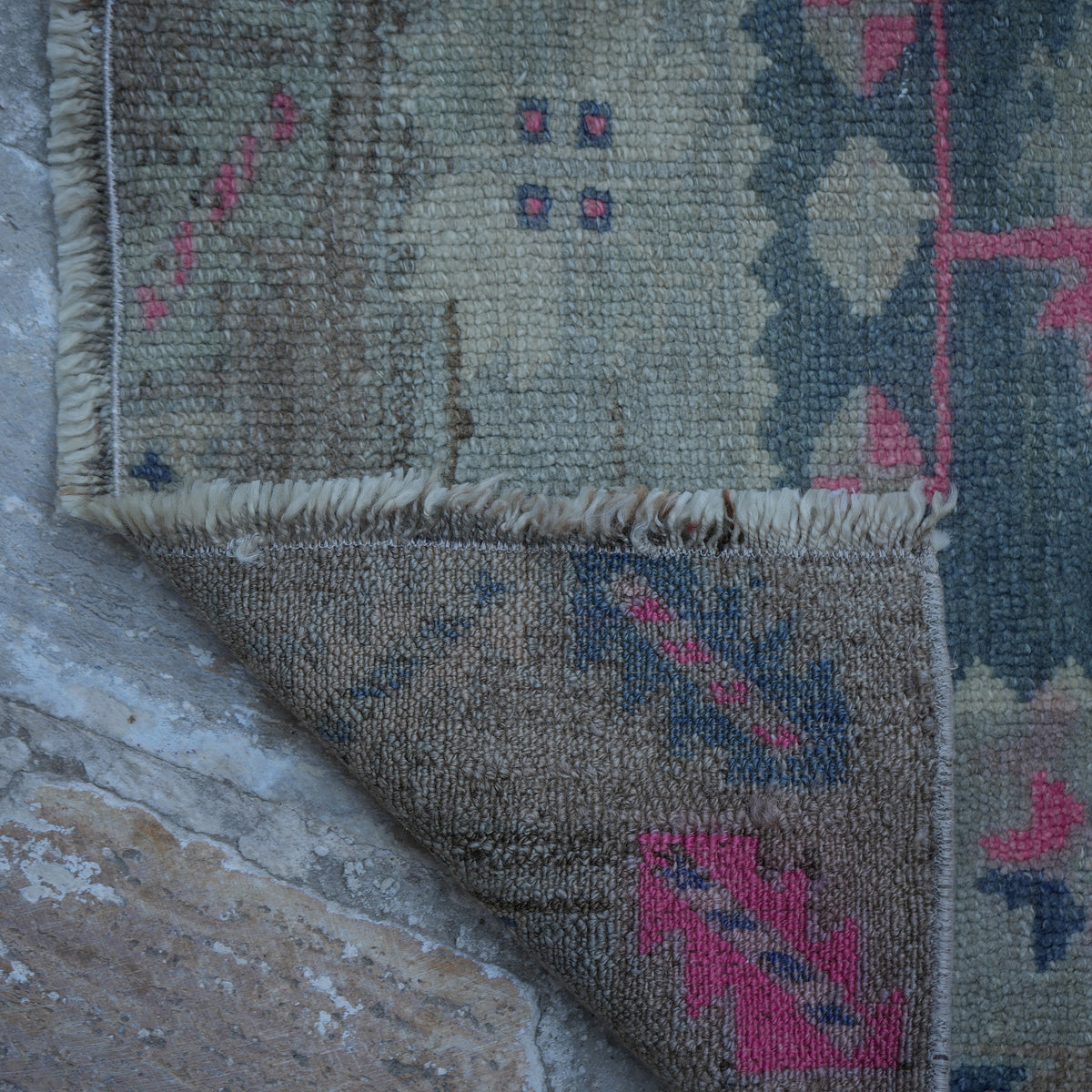 1970s beige Turkish neutral vintage rug with neutral design, hand-knotted weave and low pile.