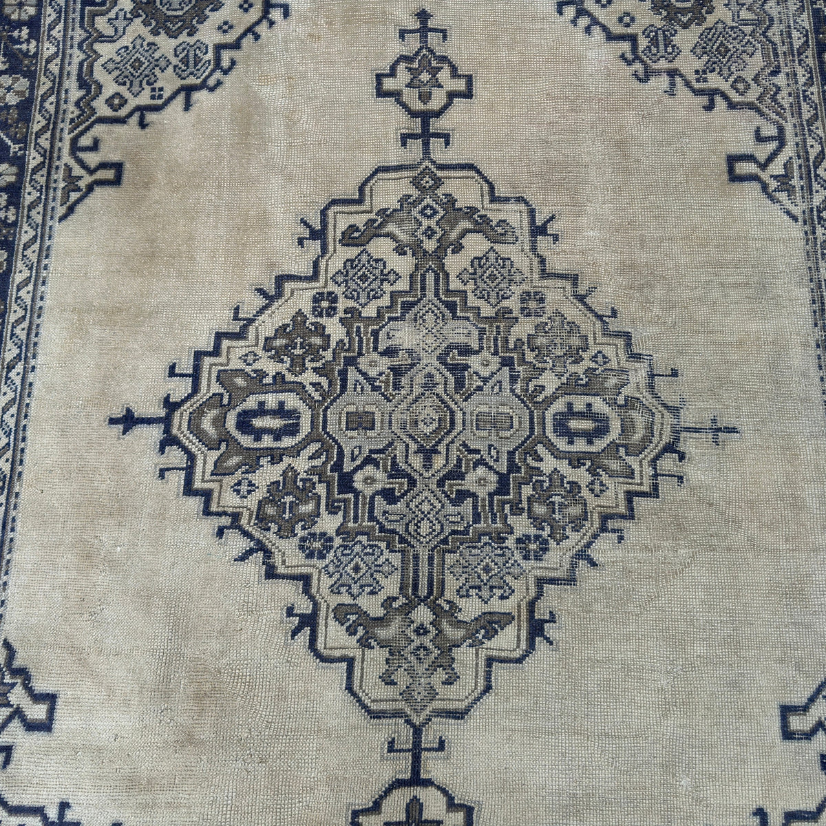 1970s blue Turkish oushak rug with oushak and medallion design, hand-knotted weave and low pile.