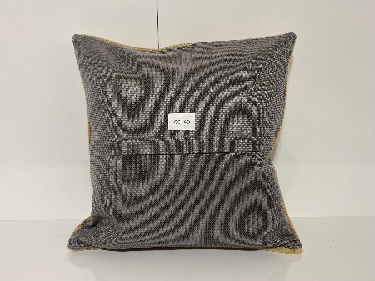 Close-up of the beige Turkish pillow cover showing neutral details, low pile.