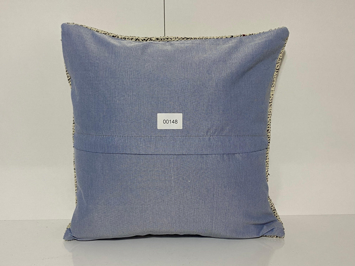 Close-up of the beige Turkish pillow cover showing traditional details, low pile.