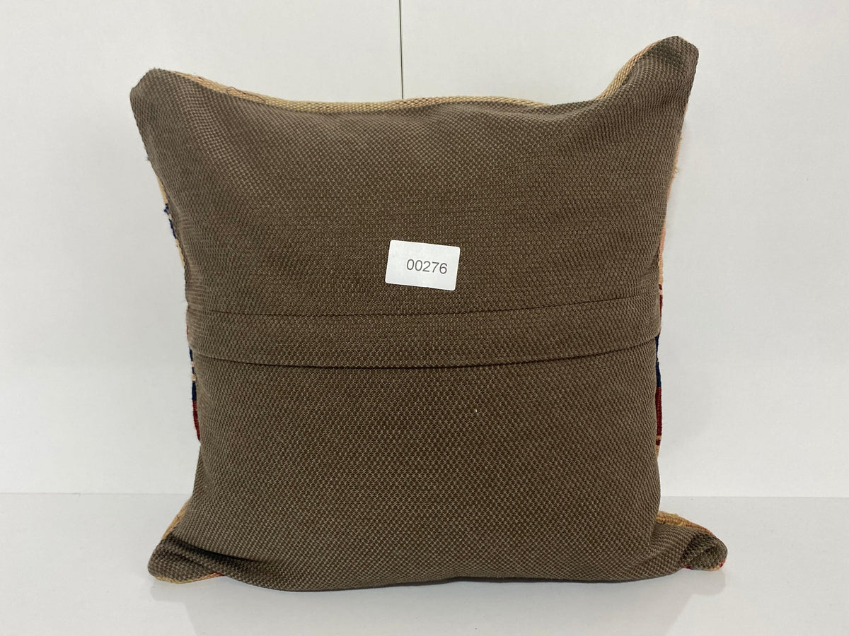 Close-up of the beige Turkish pillow cover showing traditional details, low pile.