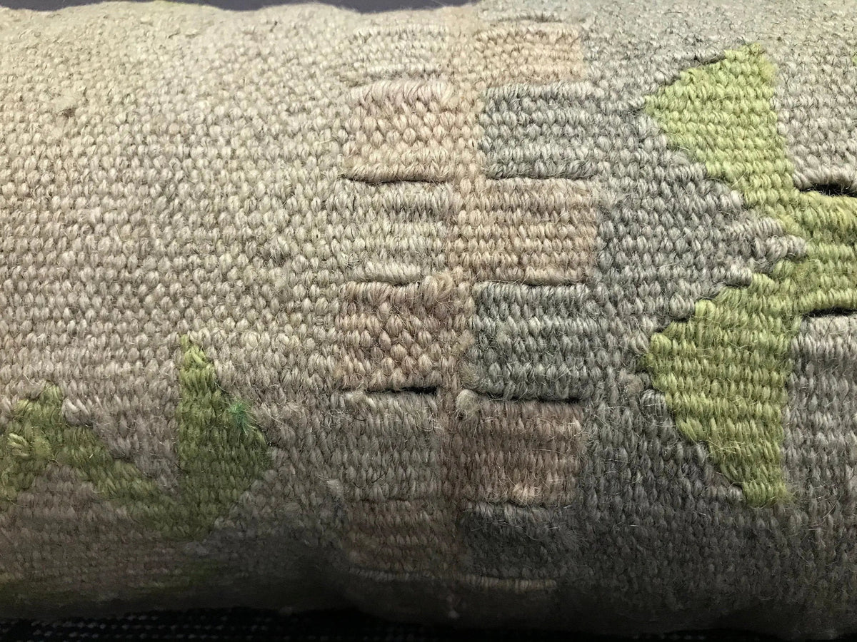 Close-up of the beige Turkish pillow cover showing neutral details, low pile.