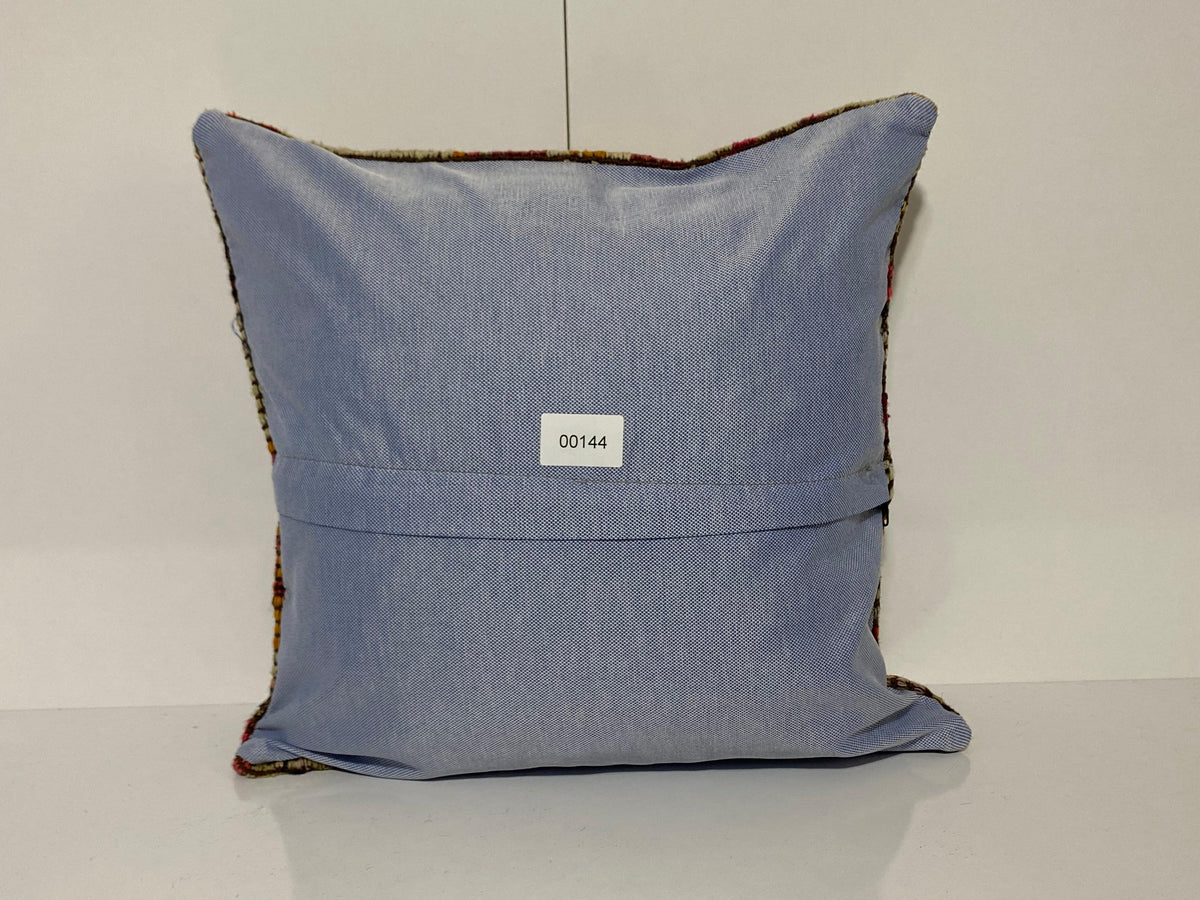 Close-up of the colorful Turkish pillow cover showing traditional details, low pile.