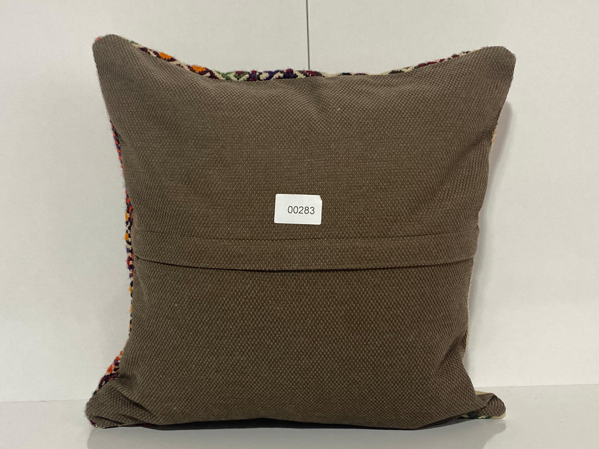 Close-up of the colorful Turkish pillow cover showing traditional details, low pile.