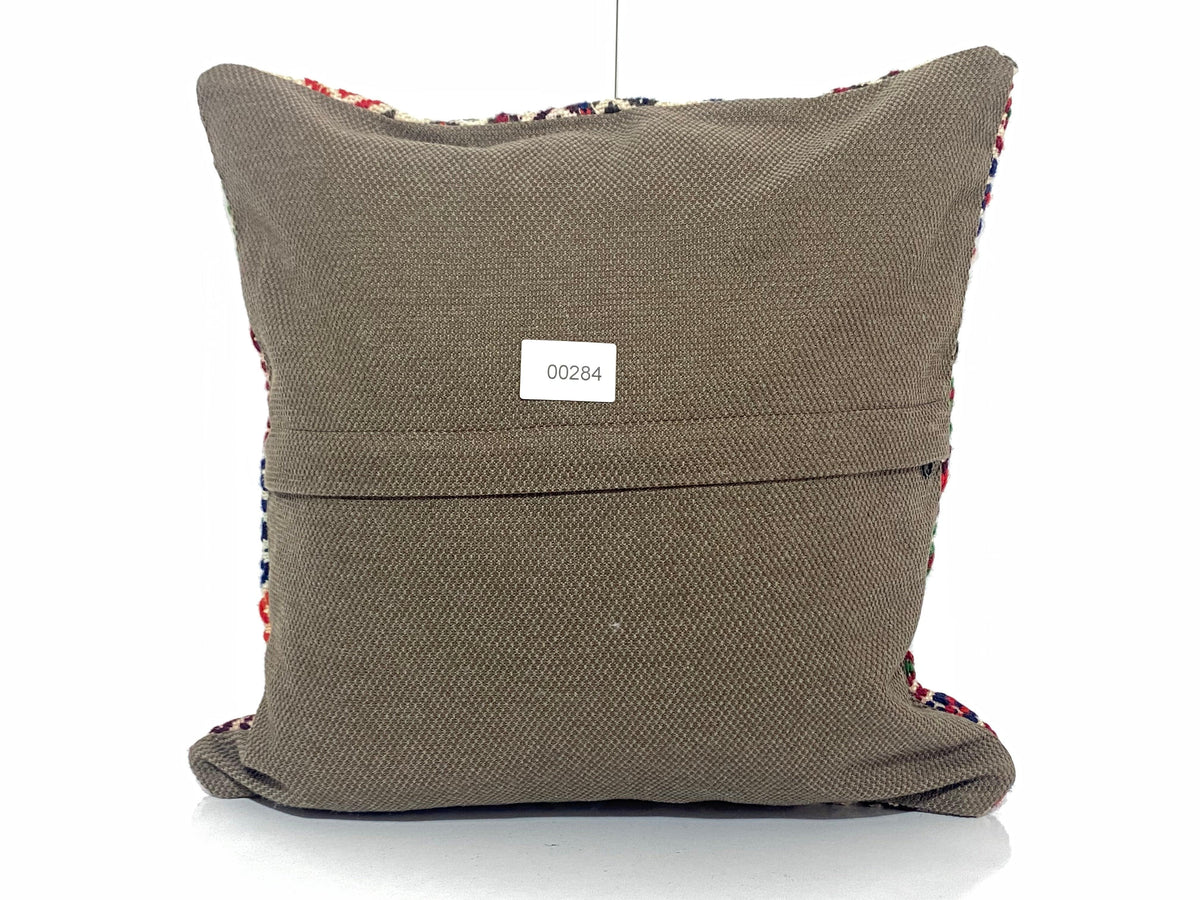 Close-up of the colorful Turkish pillow cover showing traditional details, low pile.