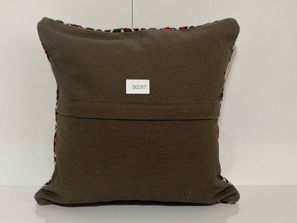 Close-up of the green Turkish pillow cover showing traditional details, low pile.
