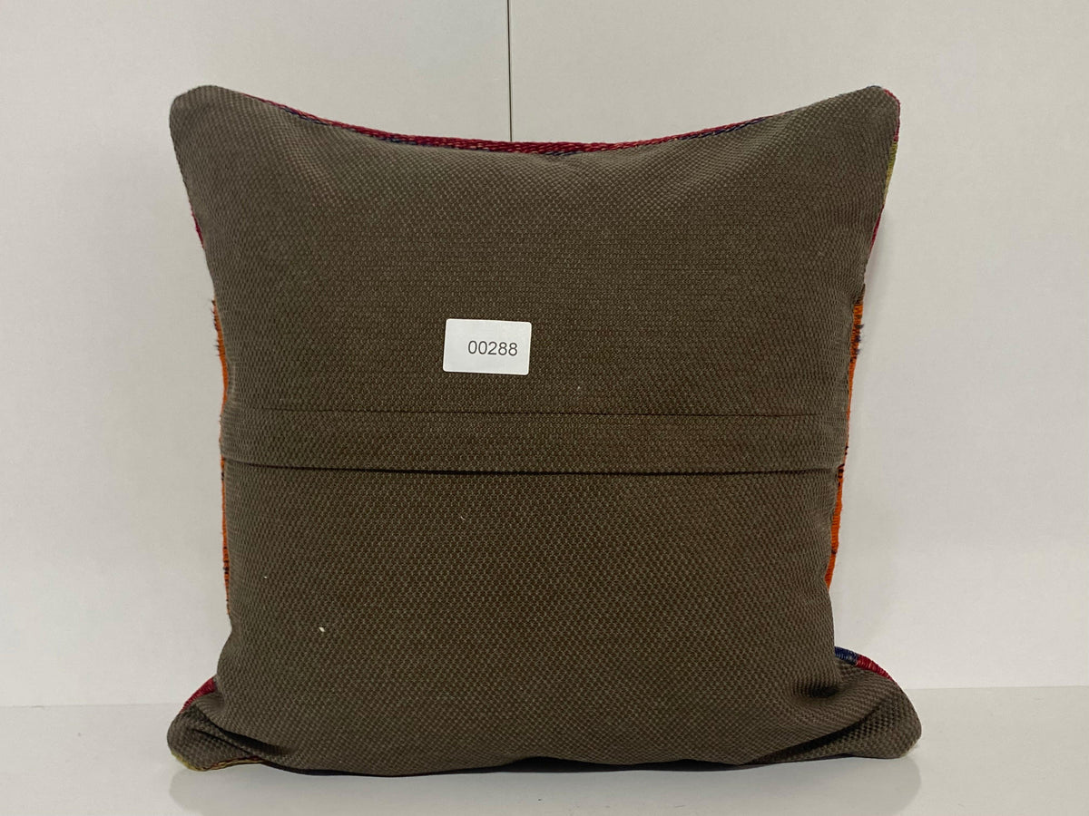 Close-up of the orange Turkish pillow cover showing traditional details, low pile.
