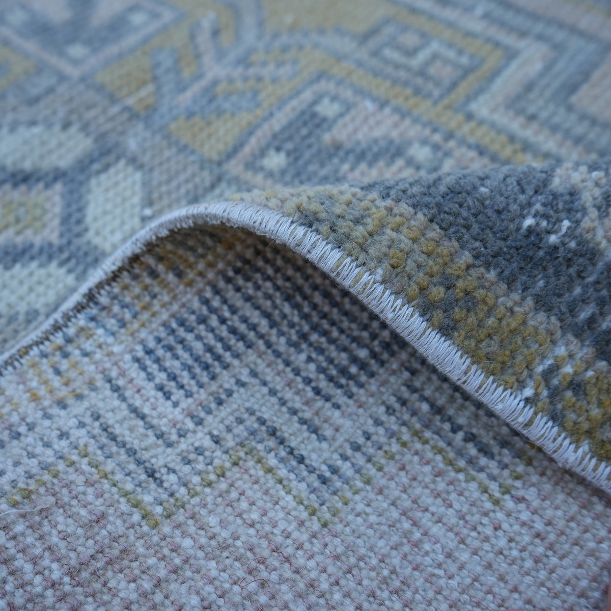 Additional view of the pink Turkish small anatolian rug, hand-knotted in wool and cotton.