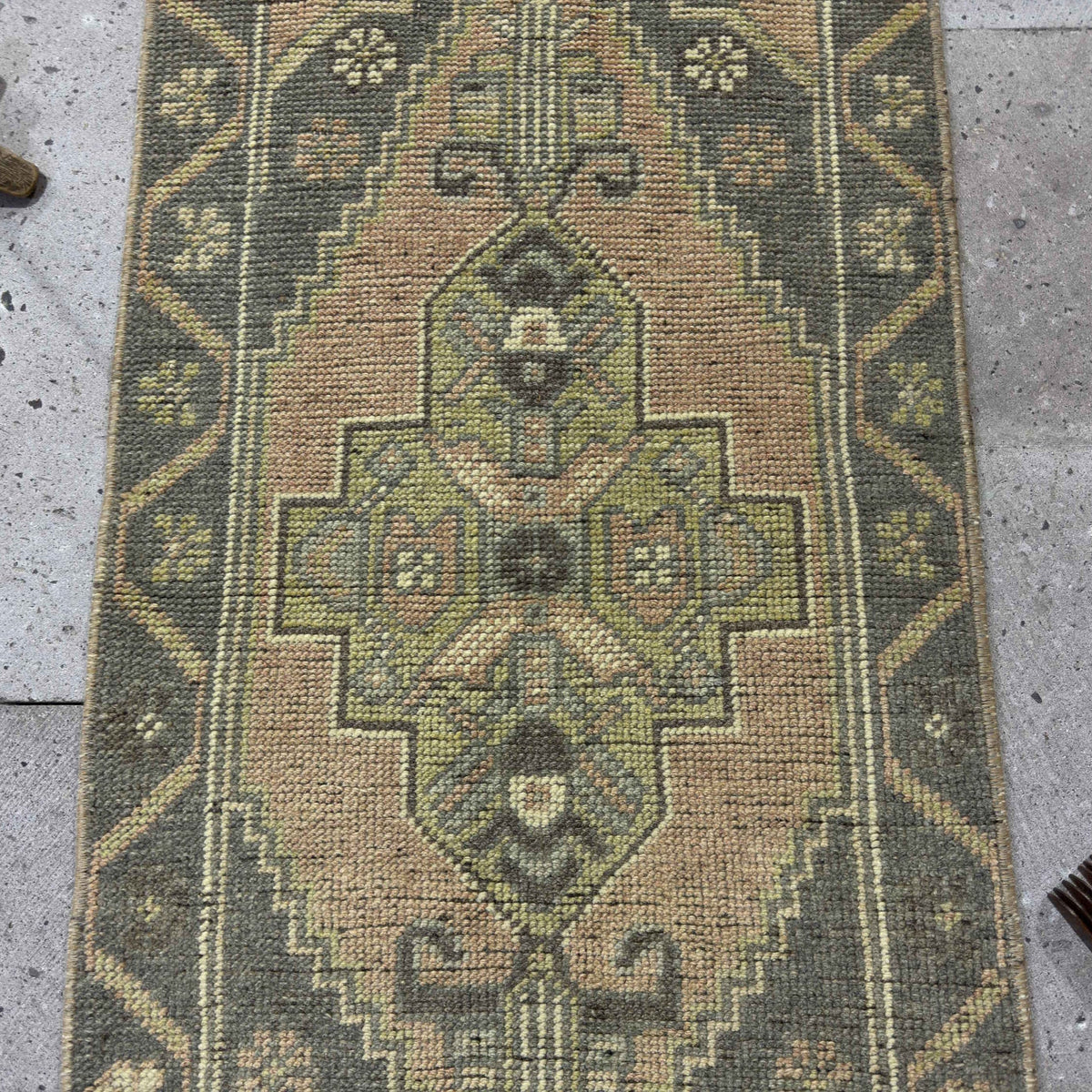 1970s gray Turkish small vintage rug with traditional design, hand-knotted weave and low pile.