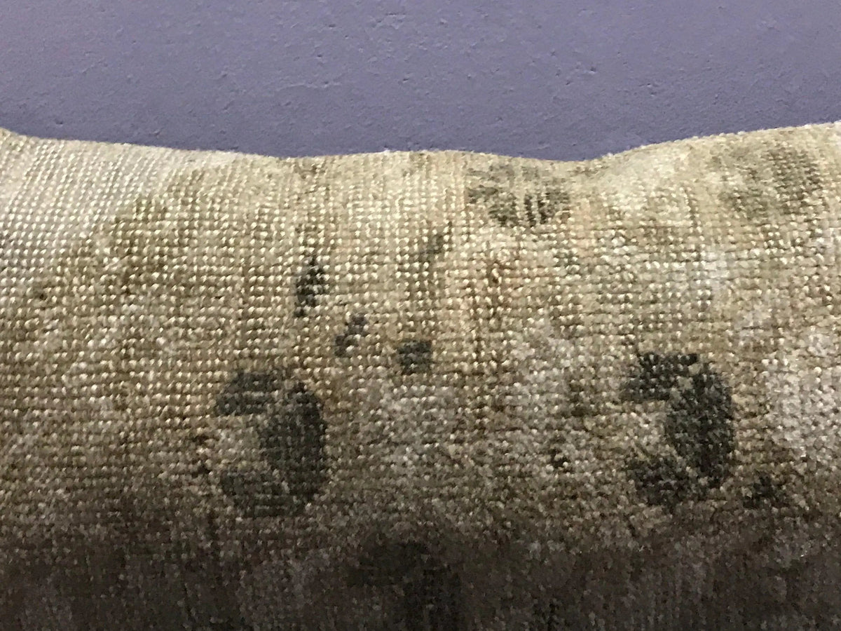 Close-up of the beige Turkish throw pillow showing traditional details, low pile.
