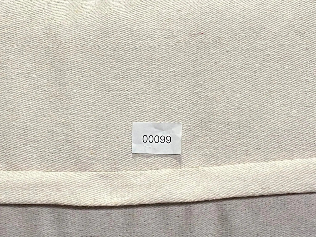 Colorful Turkish throw pillow, shown on the floor.