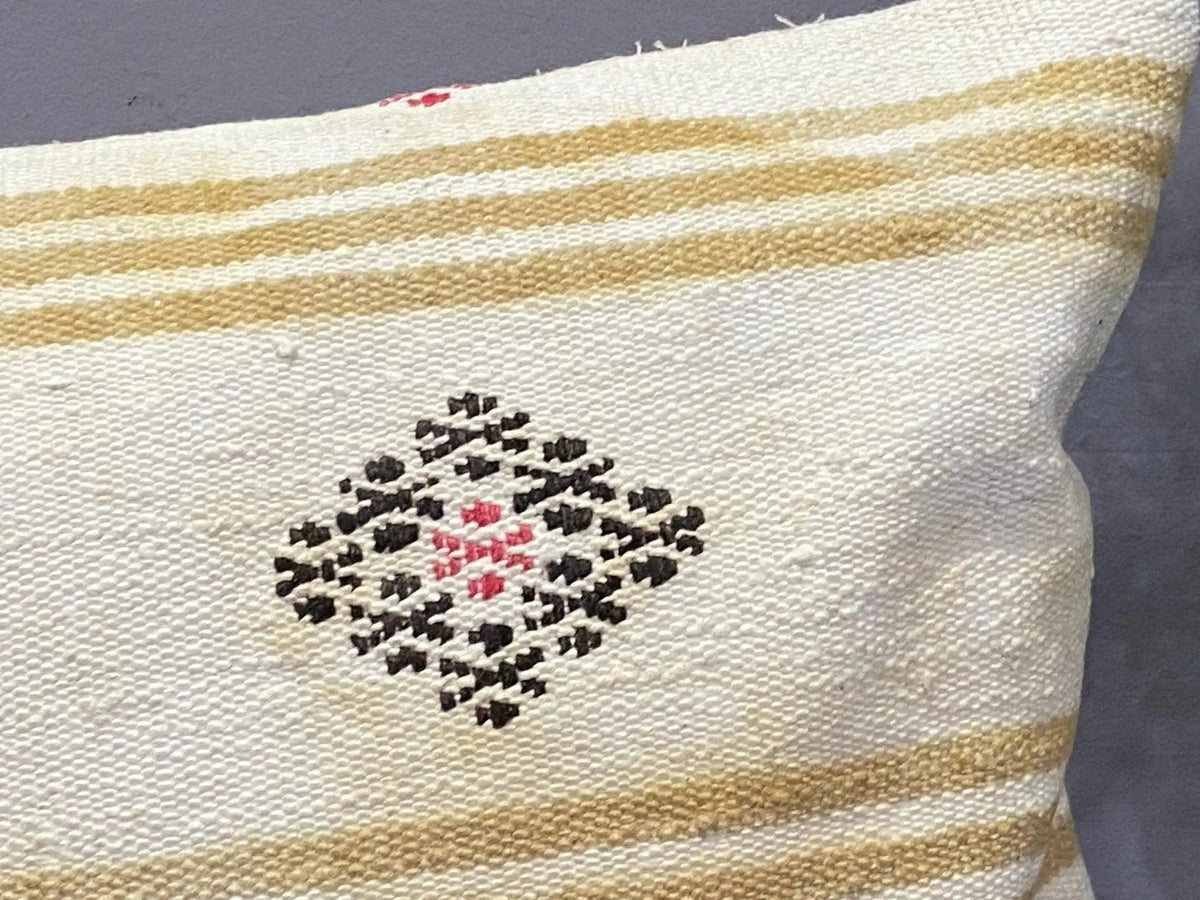 Close-up of the colorful Turkish throw pillow showing traditional details, low pile.
