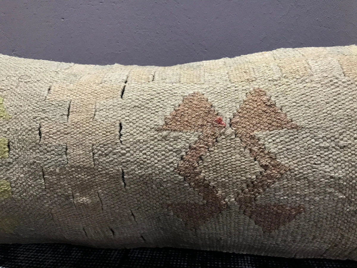 Close-up of the colorful Turkish throw pillow showing traditional details, low pile.