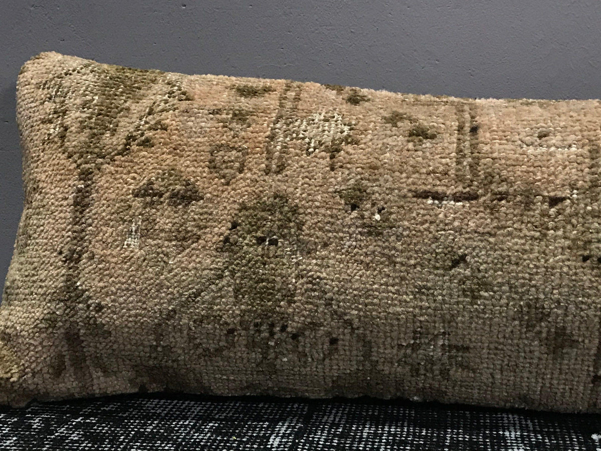 Close-up of the colorful Turkish throw pillow showing traditional details, low pile.