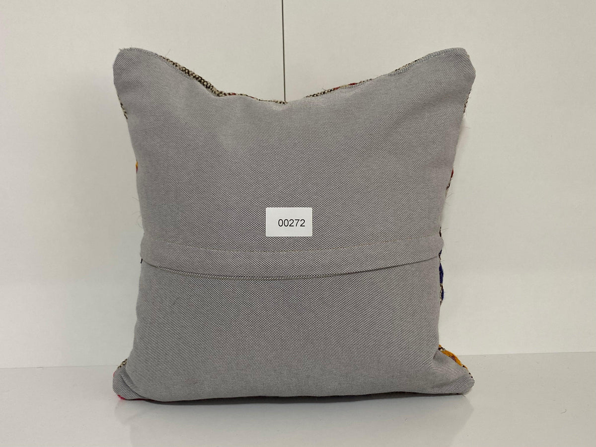 Close-up of the gray Turkish throw pillow showing traditional details, low pile.