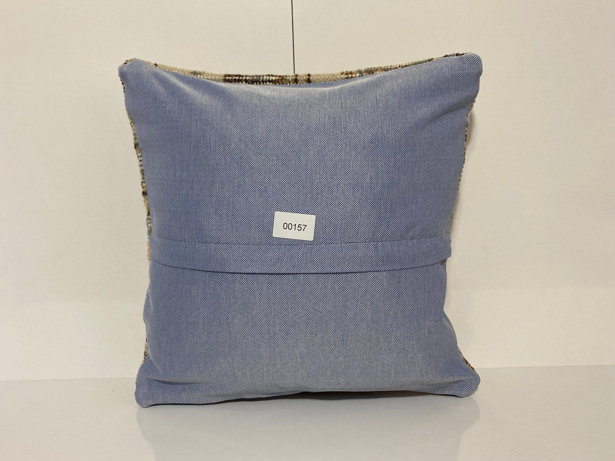 Close-up of the pink Turkish throw pillow showing traditional details, low pile.