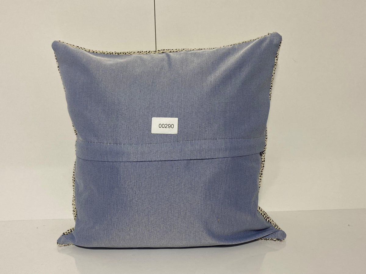 Close-up of the white Turkish throw pillow showing neutral details, low pile.