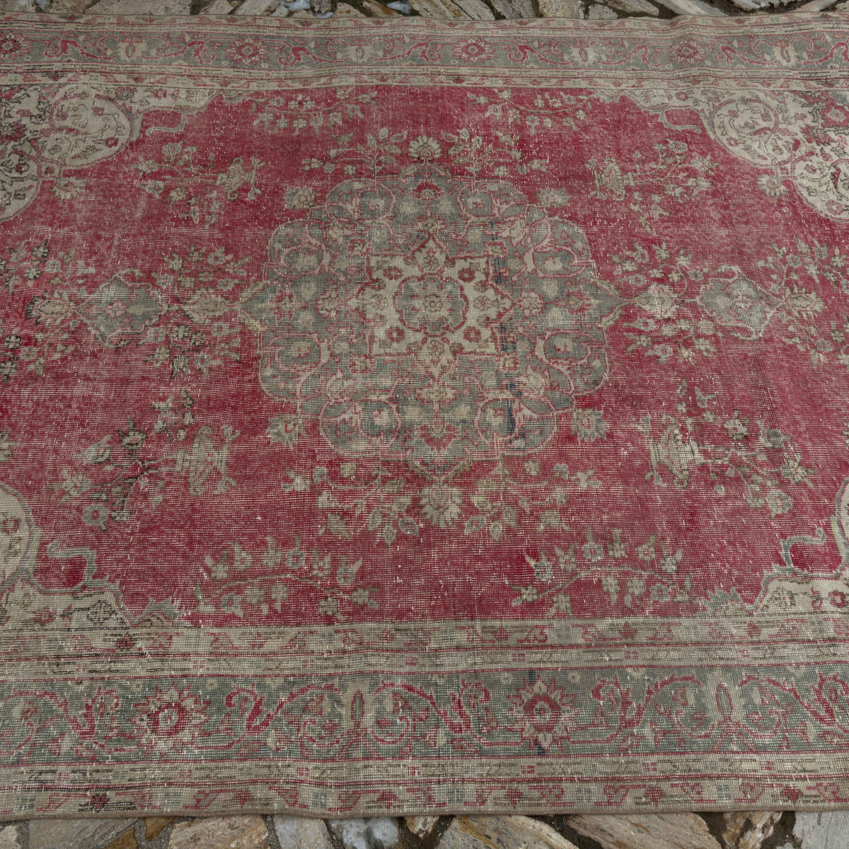 1970s red Turkish traditional anatolian rug with traditional design, hand-knotted weave and low pile.
