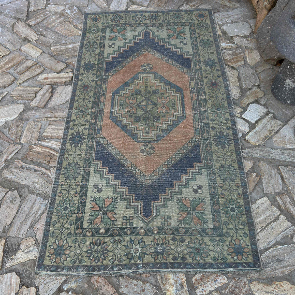 Orange 4' x 6' Turkish traditional vintage rug in wool and cotton, shown on the floor.