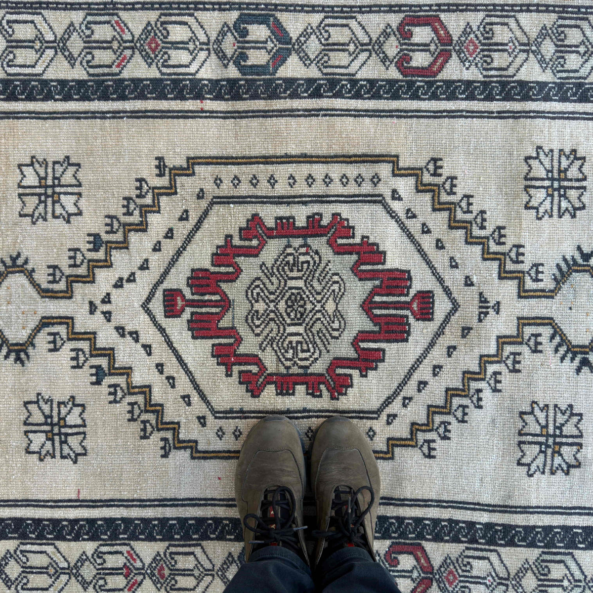 1970s red turkish geometric rug with traditional design, hand-knotted weave and low pile.