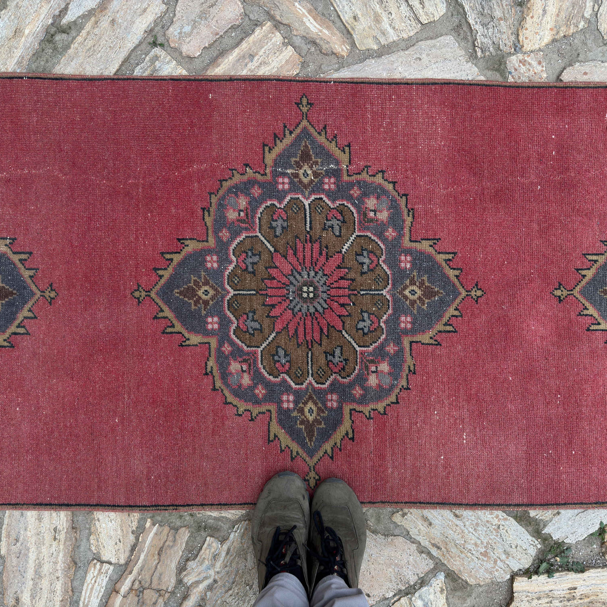1970s red turkish geometric runner rug with traditional design, hand-knotted weave and low pile.