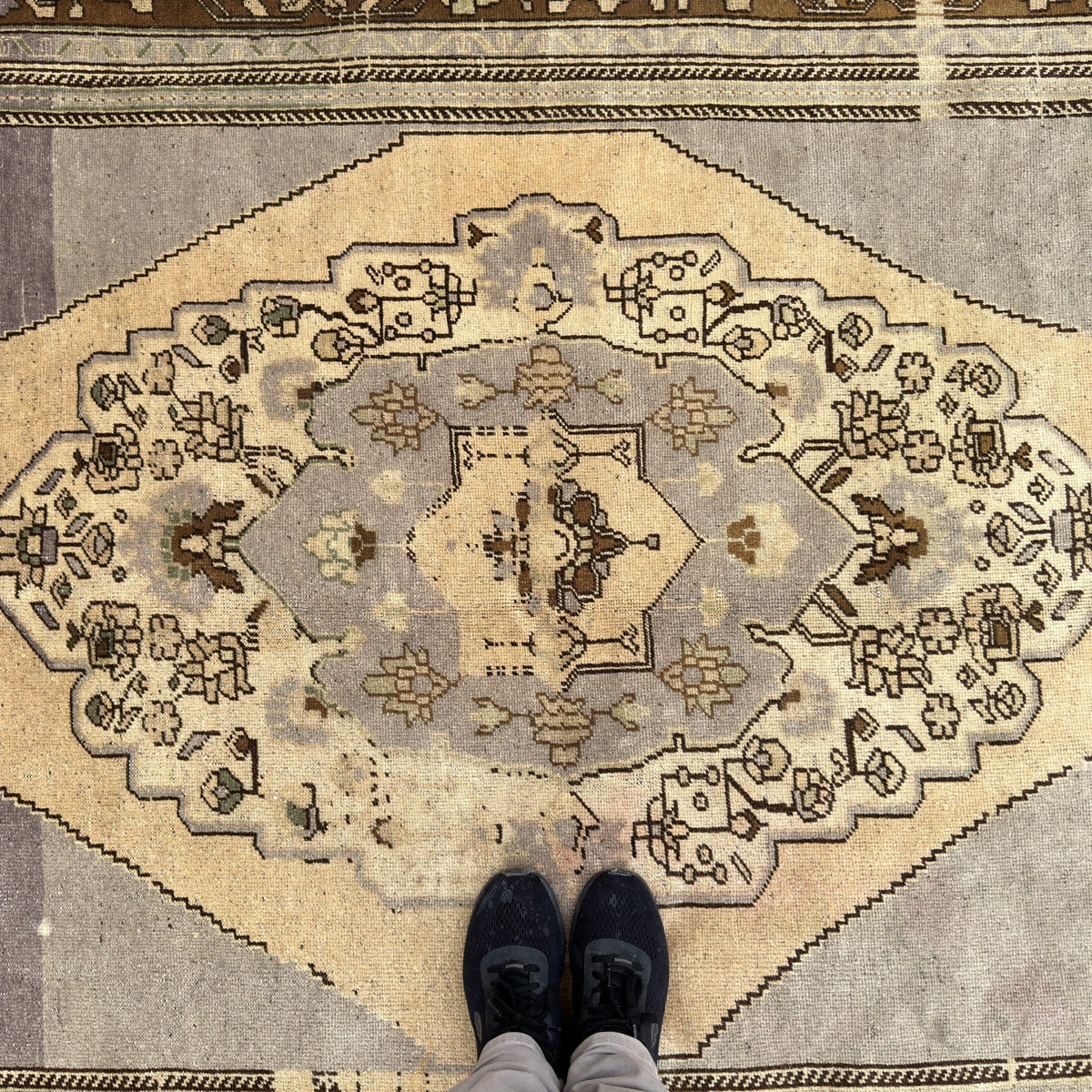 1970s gray turkish rug with traditional design, hand-knotted weave and low pile.
