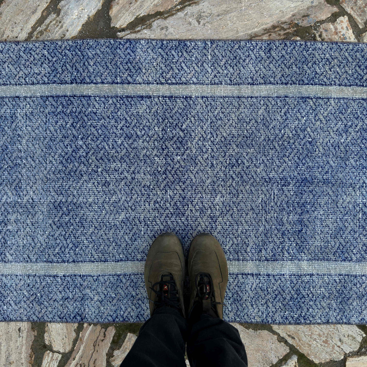 1970s blue turkish runner rug with traditional design, hand-knotted weave and low pile.