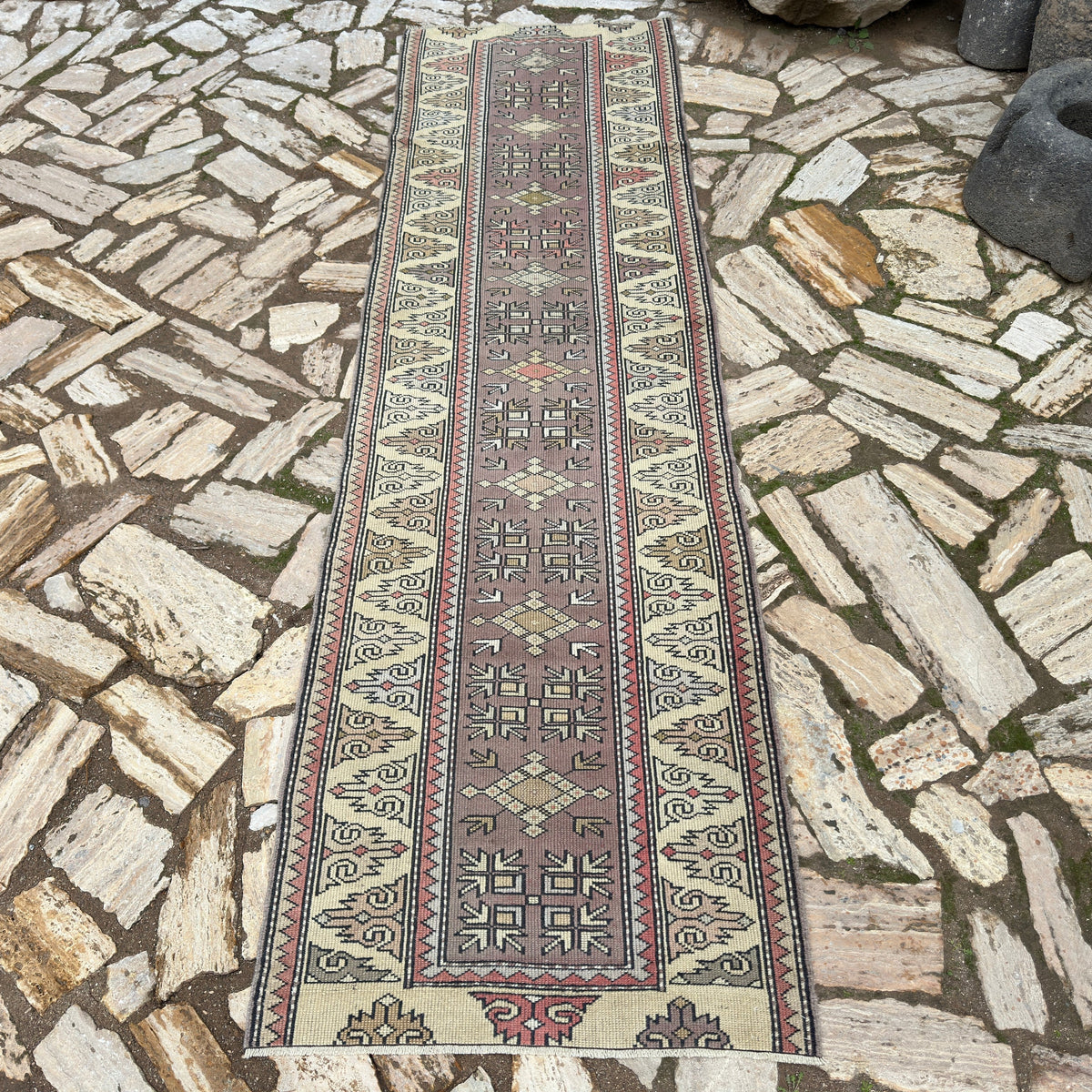 Beige 3' x 9' turkish runner rug in wool and cotton, shown on the floor.