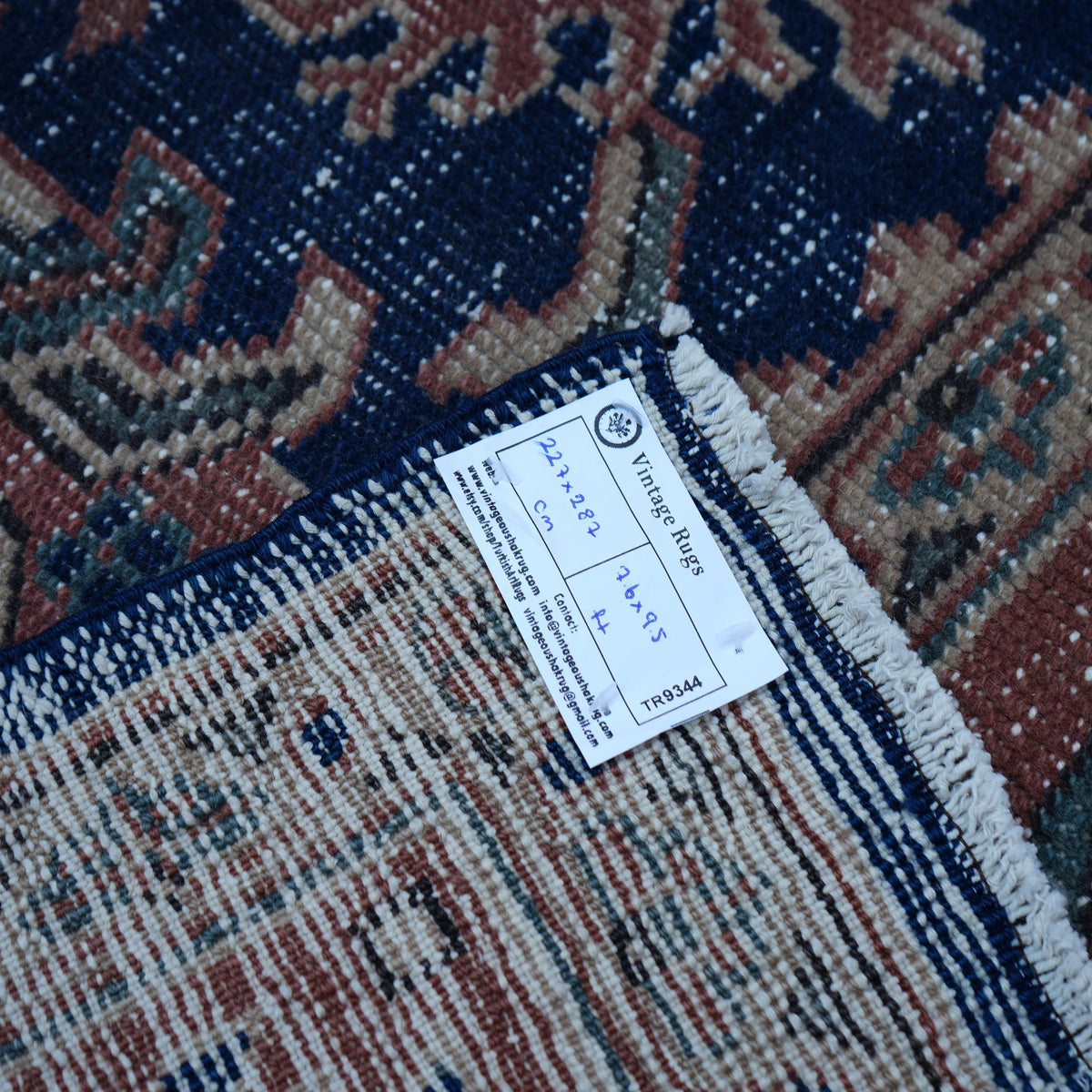 Blue 7' x 9' Turkish unique vintage oushak rug from the 1970s with traditional design.