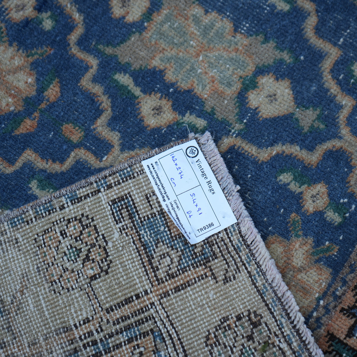 Blue 5' x 9' Turkish unique vintage rug from the 1970s with geometric design.