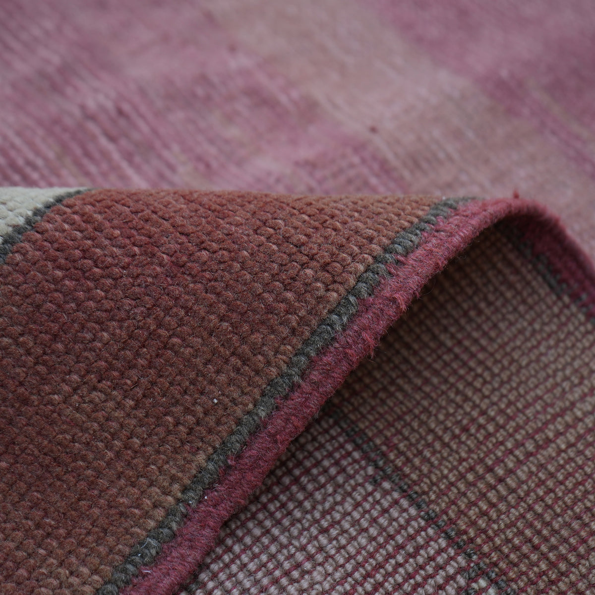 Additional view of the pink Turkish unique vintage rug, hand-knotted in wool.