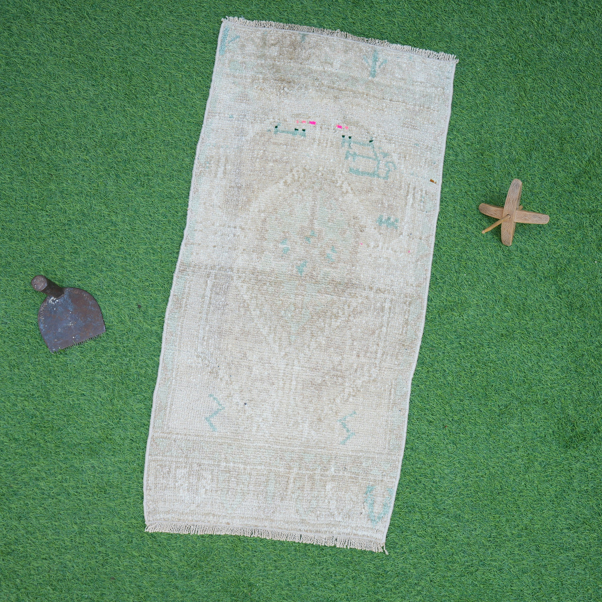 Beige 2' x 3' vintage area rug with neutral design, handmade in Turkey – Stella.