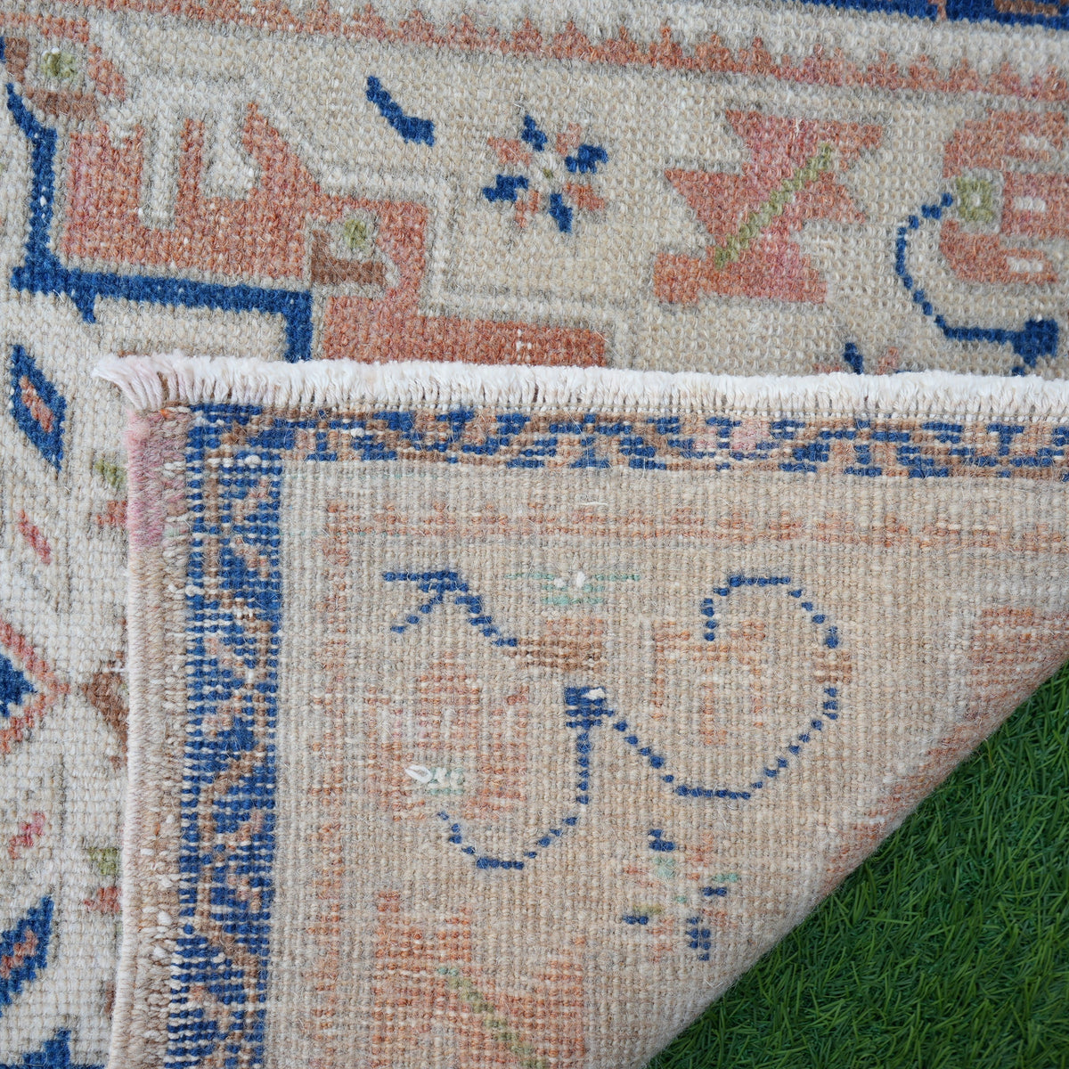 Additional view of the blue vintage Turkish area rug, hand-knotted in wool and cotton.