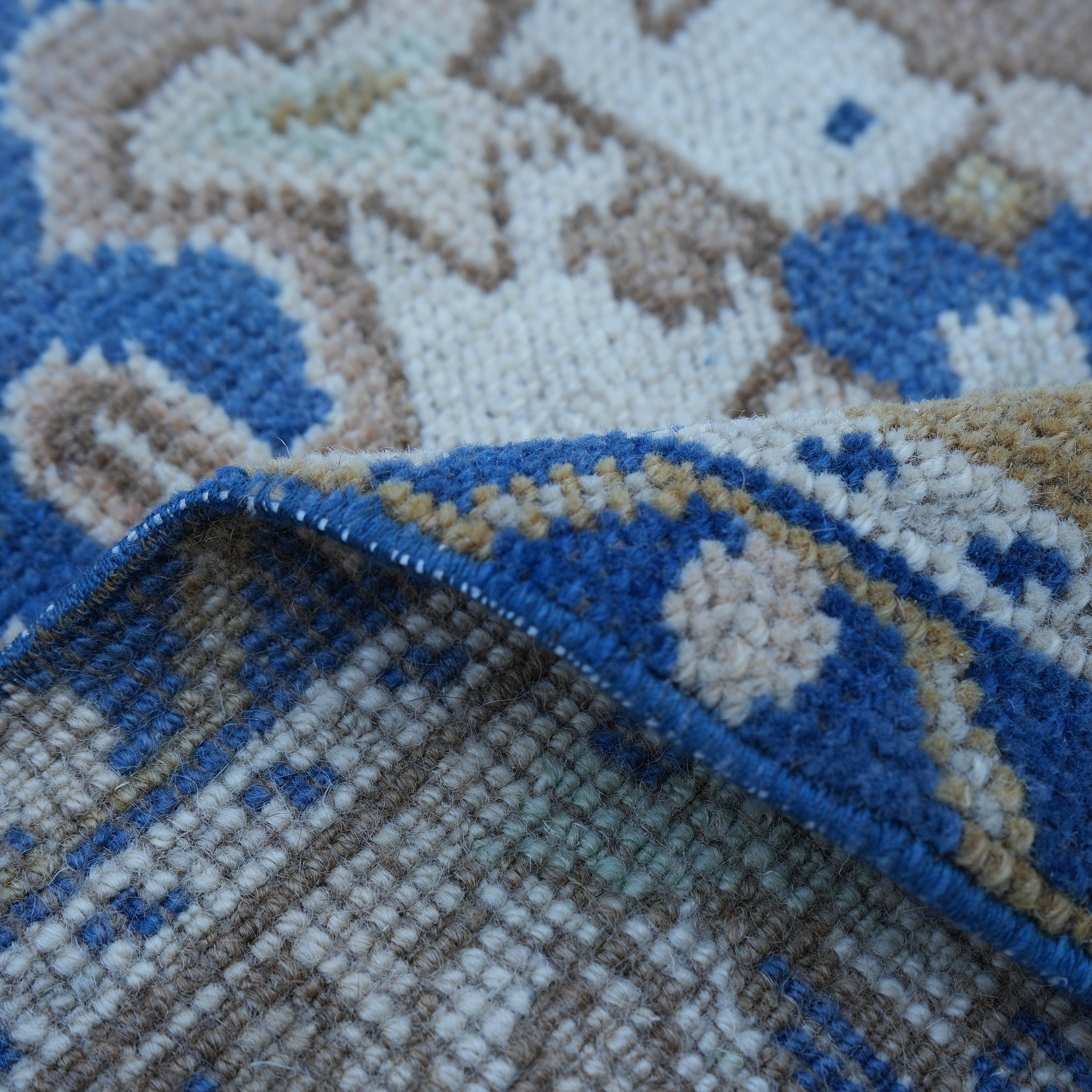 Additional view of the blue vintage Turkish area rug, hand-knotted in wool and cotton.