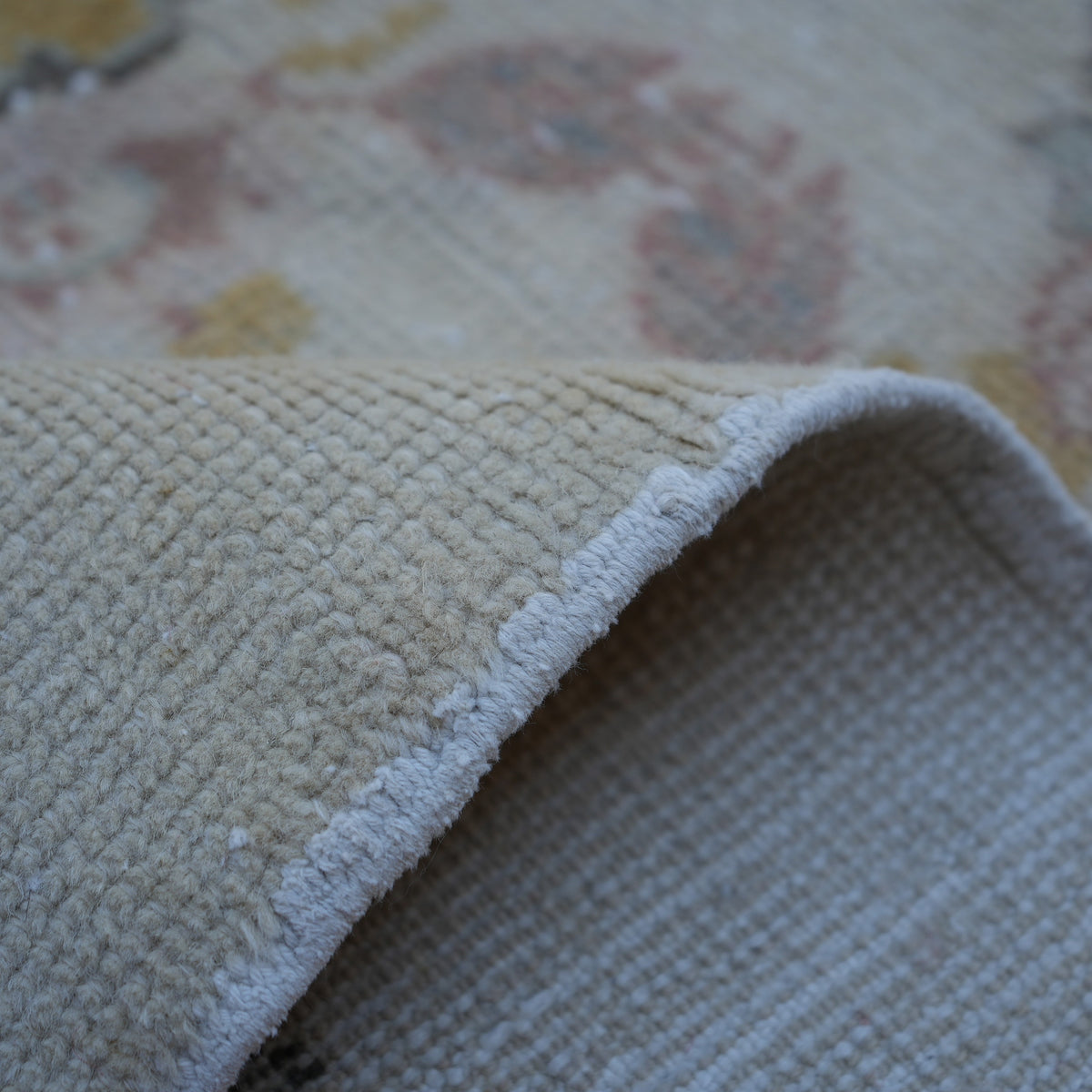 Additional view of the beige vintage Turkish area rug, hand-knotted in wool and cotton.