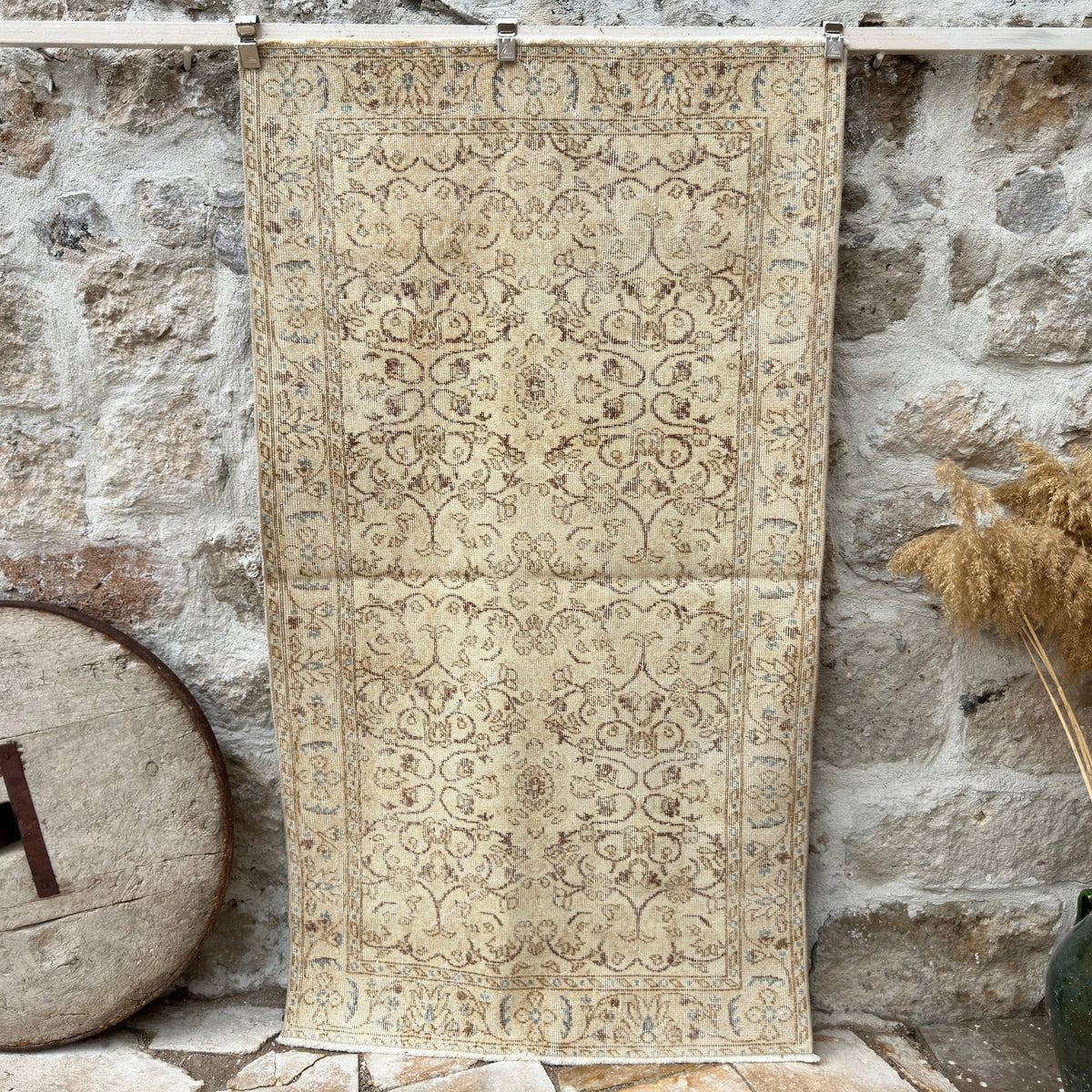 Beige 4' x 7' vintage area rug with floral design, handmade in Turkey – Roland.