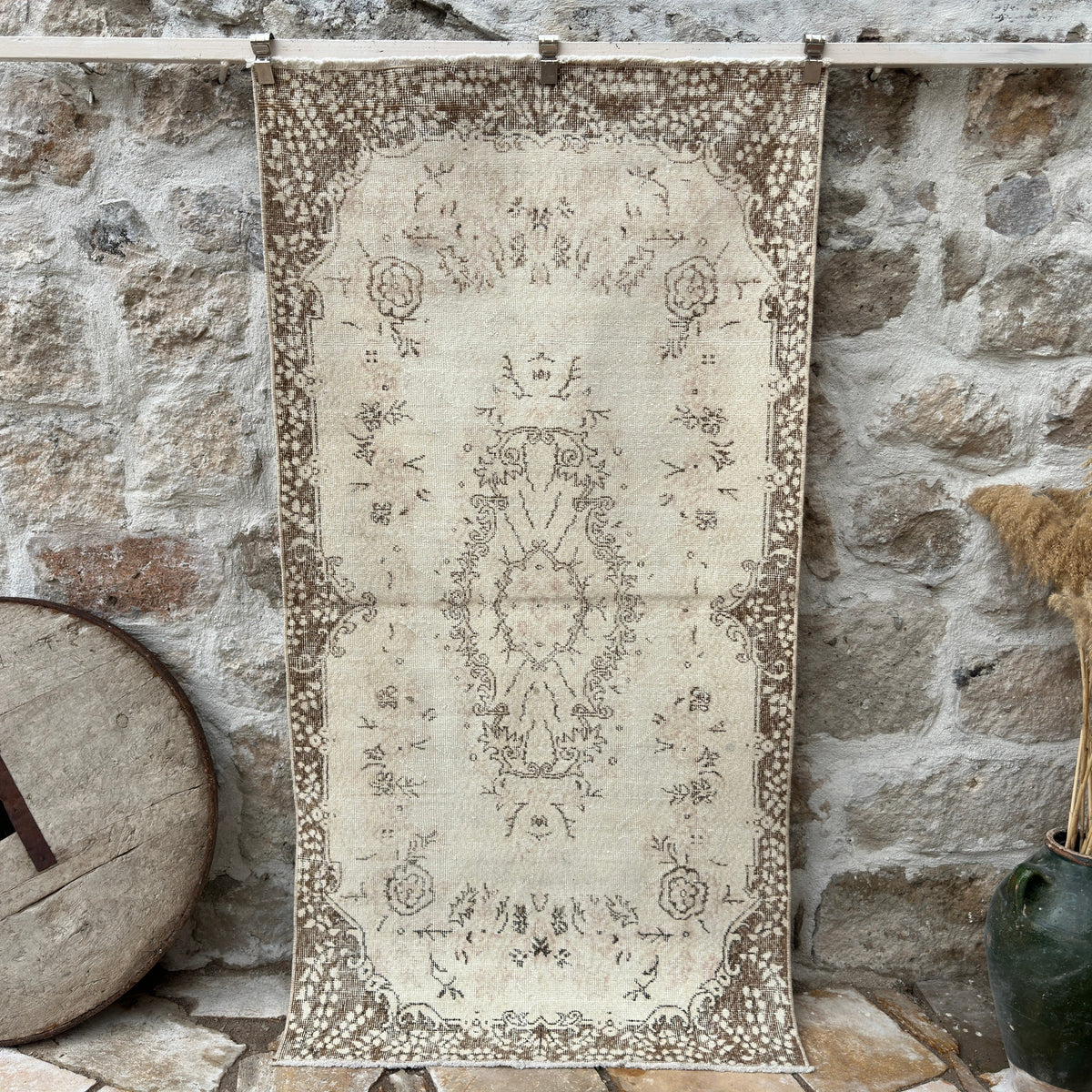 Brown 4' x 7' vintage area rug with medallion design, handmade in Turkey – Collier.