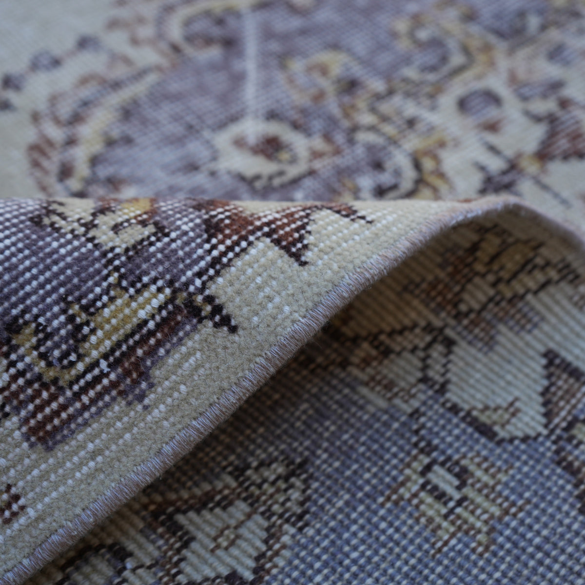 Additional view of the purple vintage Turkish area rug, hand-knotted in wool and cotton.