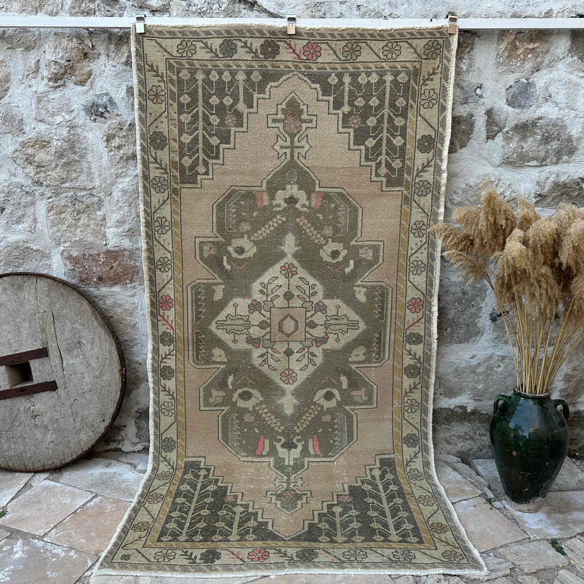 Pink 5' x 9' vintage area rug with traditional design, handmade in Turkey – Delbert.